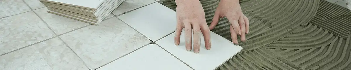 Professional installing white tile floors in Raleigh, NC