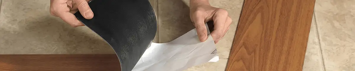 A professional installing vinyl flooring in Raleigh, NC